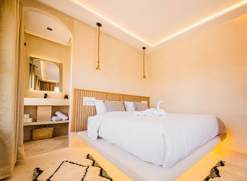 Premium bungalow bedroom at Kiteboarding Club KBC New Spirit Dakhla - luxury accommodation for kitesurfers in Morocco