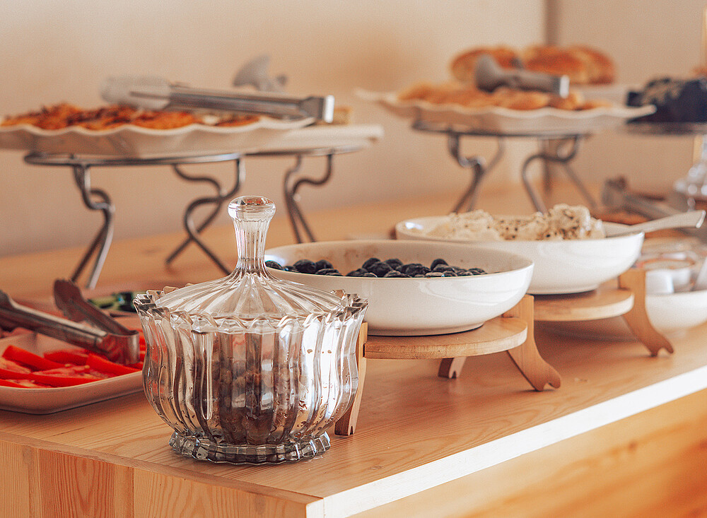 NewSpiritDakhla Breakfast buffet with fresh fruits and pastries for kiteboarding travelers at beach destination