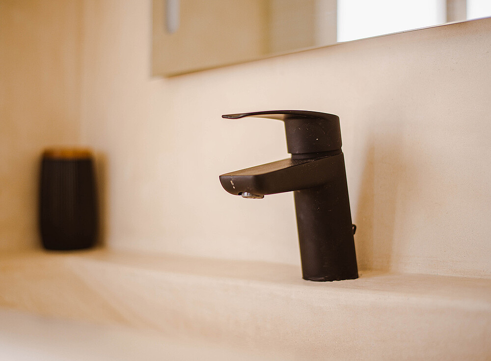 Modern black faucet in NewSpiritDakhla Premium Bungalow - luxury kiteboarding accommodation Dakhla Morocco