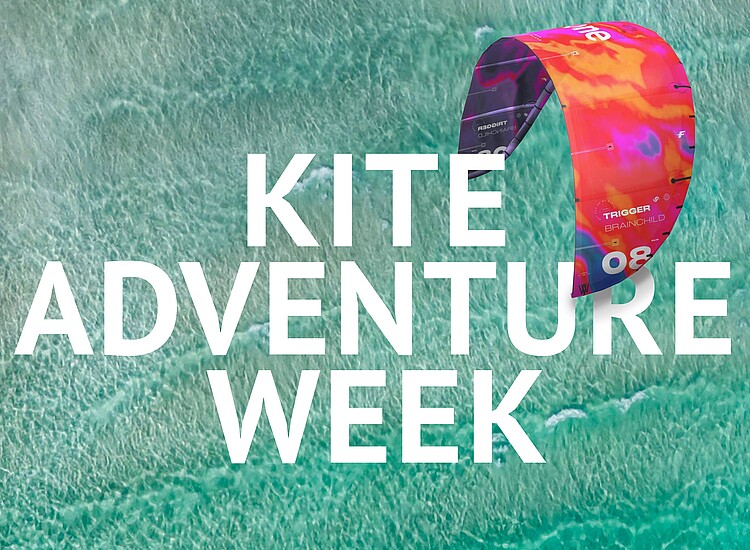 Kite Adventure Week - Colorful kiteboarding kite over turquoise waters at KBC Kitesurf Center Sizilien Lo Stagnone