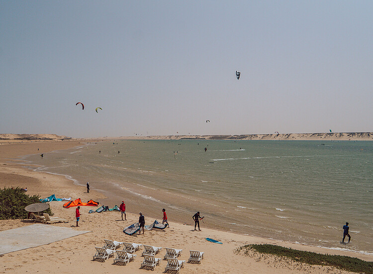 Kiteboarding beach in Dakhla Morocco with kites in water at Kiteboarding Club KBC New Spirit Dakhla, NewSpiritDakhla center