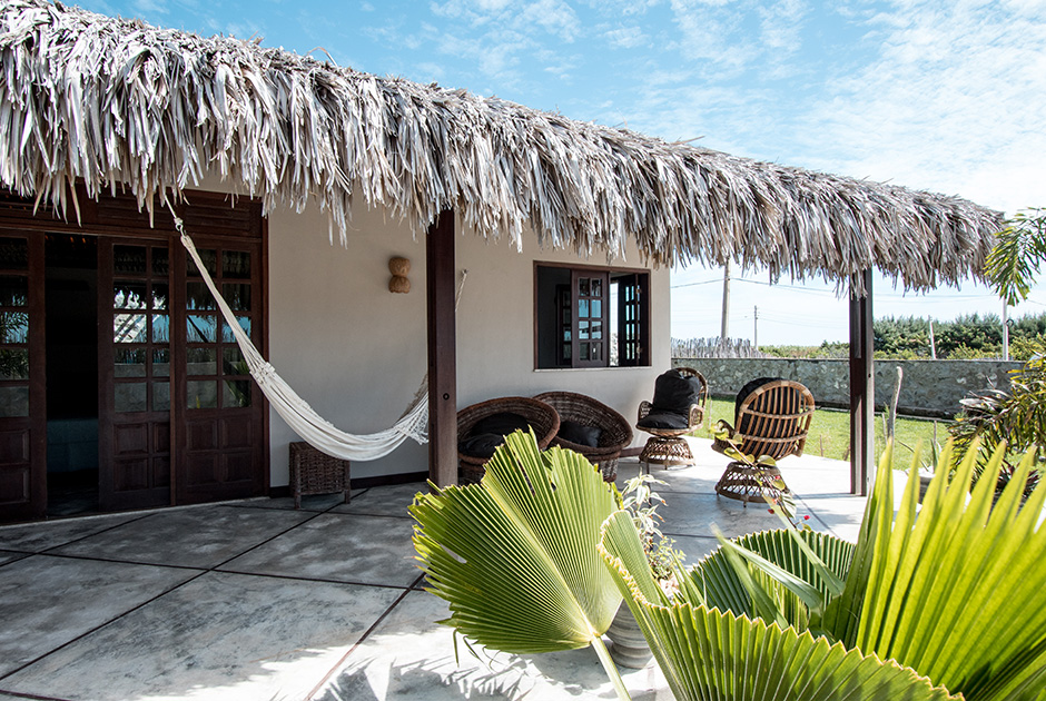 Relaxation area with hammock and wicker chairs at Kiteboarding Club KBC Parajuru, Brazil kitesurfing travel destination