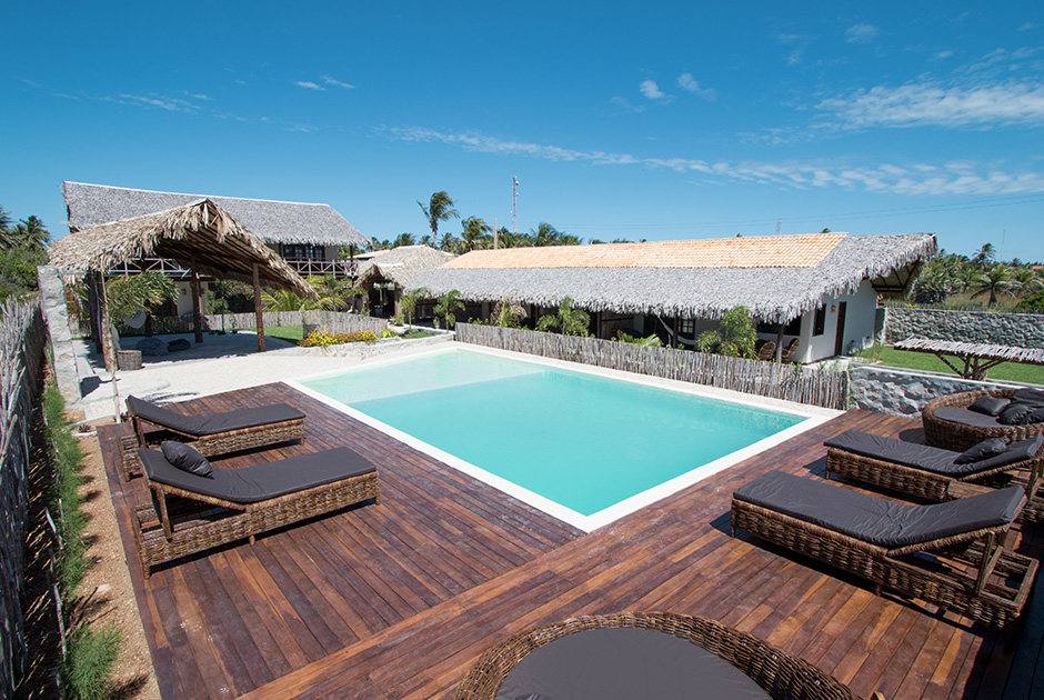 Luxury pool deck at Kiteboarding Club KBC Parajuru - Premium kitesurf resort accommodation in Brazil