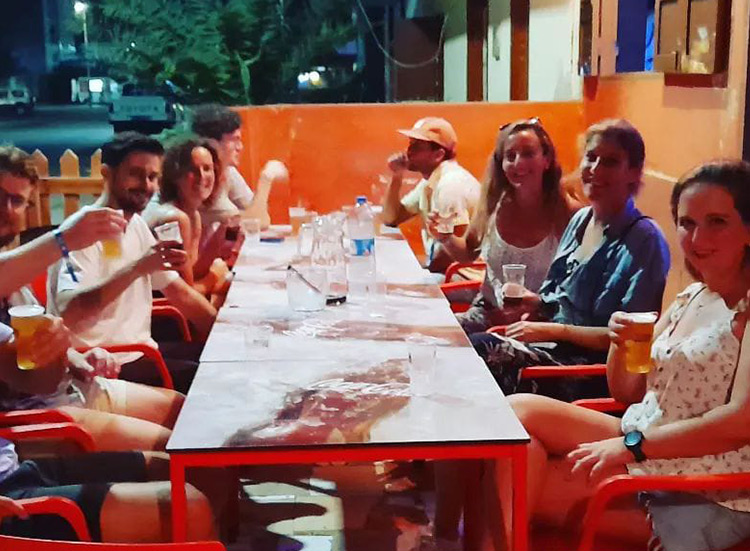 Kitesurfers enjoying dinner together at Kiteboarding Club KBC Sal Surf Hub - Kitesurf Event social gathering