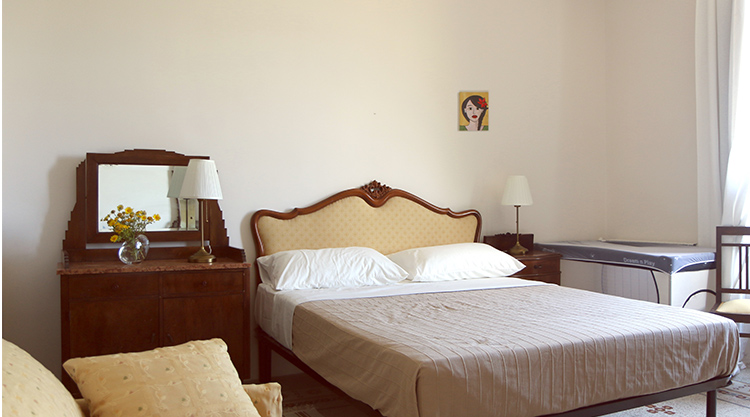 Comfortable hotel room with double bed for kiteboarding travelers at beach destination water sports location